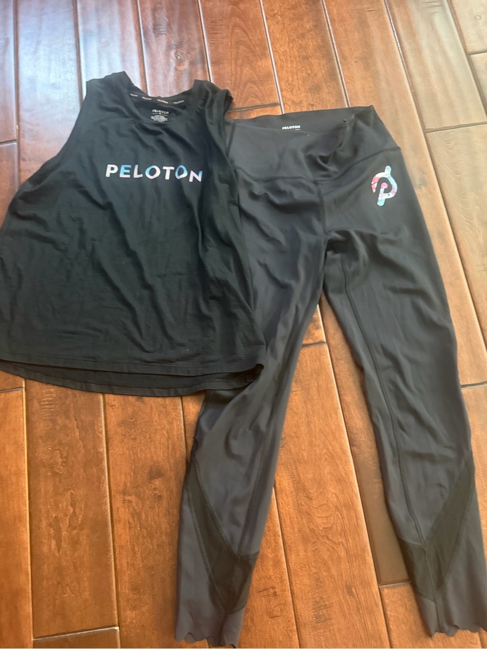Peloton Black Tank Top and Black Leggings with Multicolor Logo